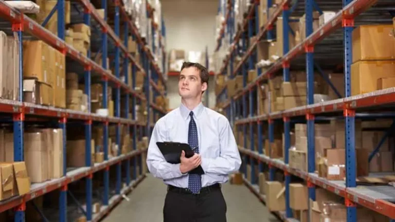 A man standing in a business storage unit
