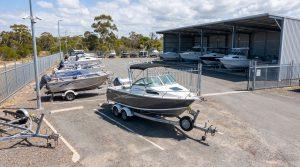 Boat storage in Deception Bay facility showing secure hardstand bays and undercover parking